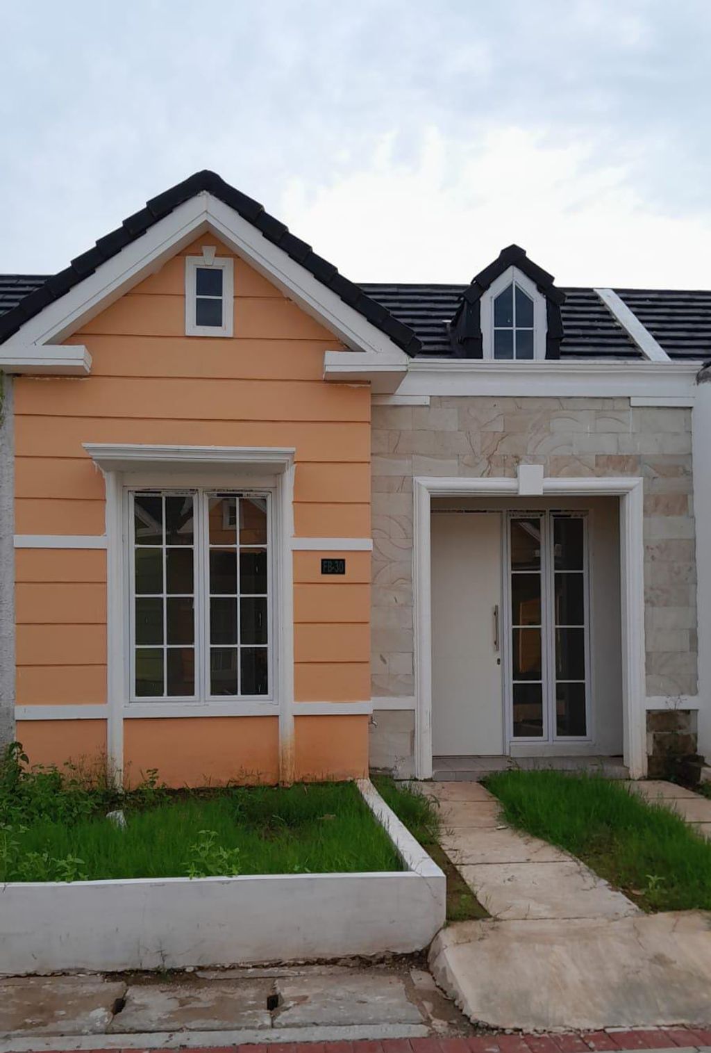 foto tampak rumah tipe 36/71 perumahan BRITANIA BEKASI (TAHAP 2)