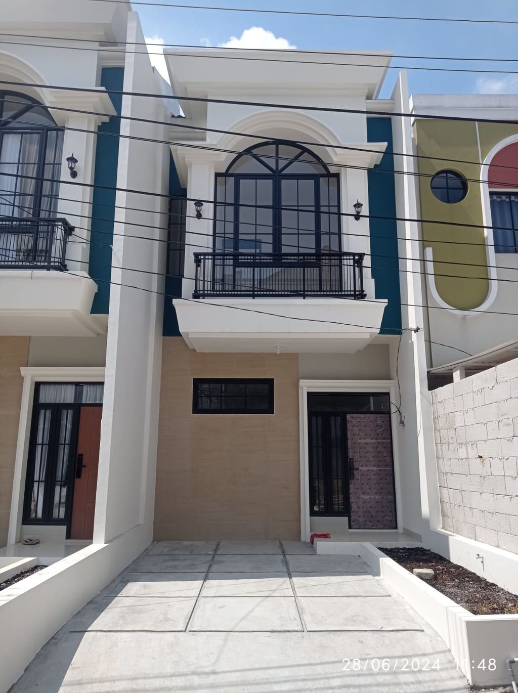foto tampak rumah tipe 52 Compact 3KT + Teras (596) perumahan G-Land Ciwastra Park