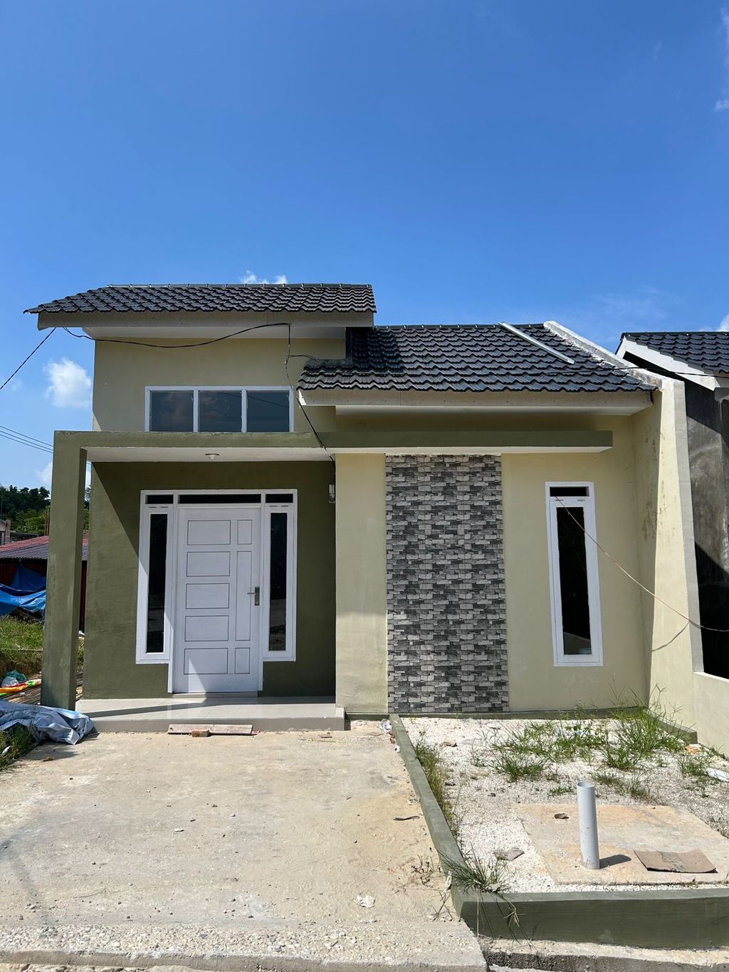 foto tampak rumah tipe 36 perumahan GRAND FATHYAH 3