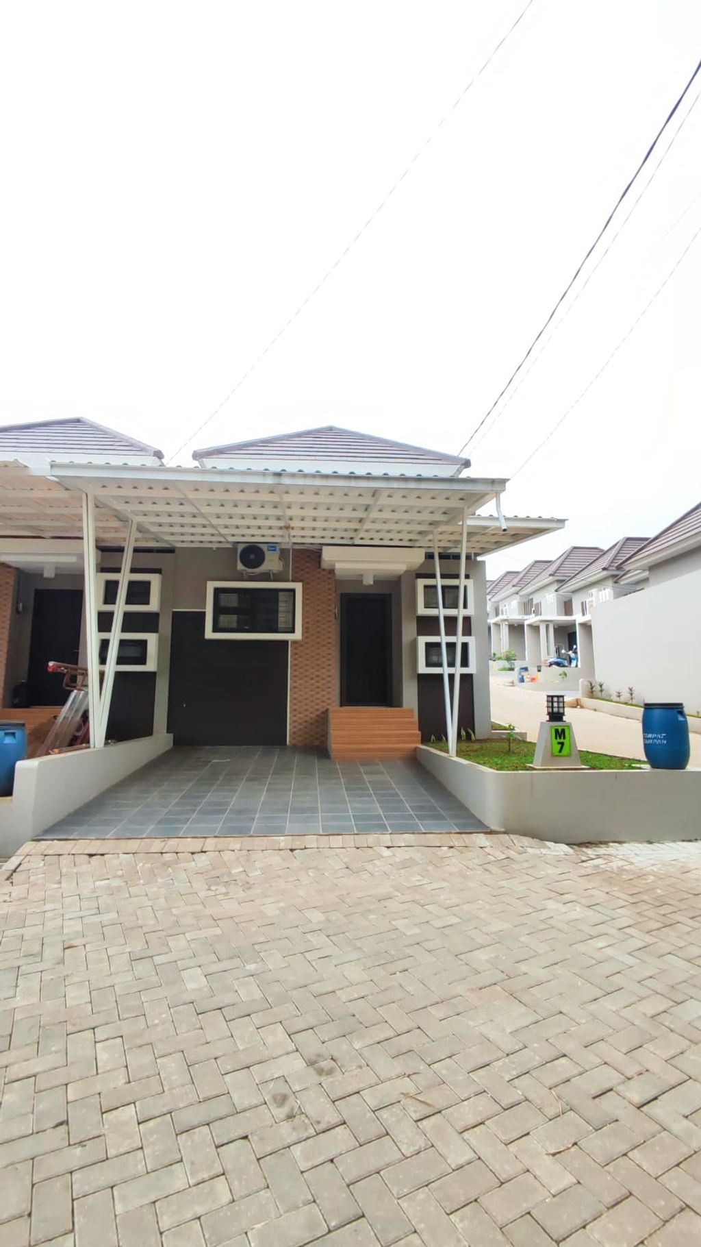 foto tampak rumah tipe 40 perumahan LEMIRAGE HILL