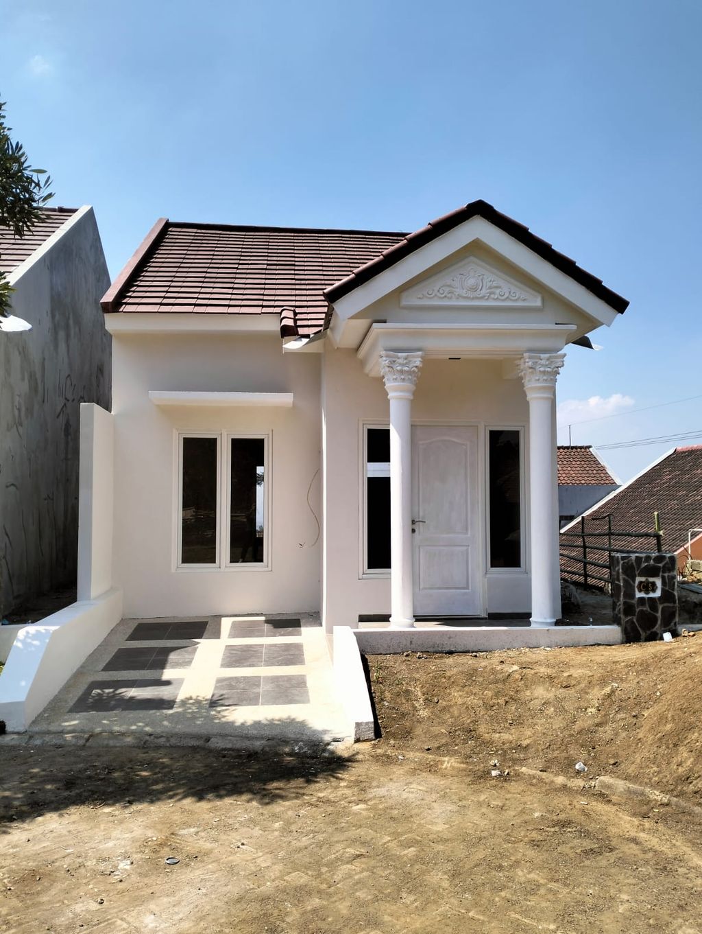 foto tampak rumah tipe 36 perumahan MOUNTAIN BOULEVARD