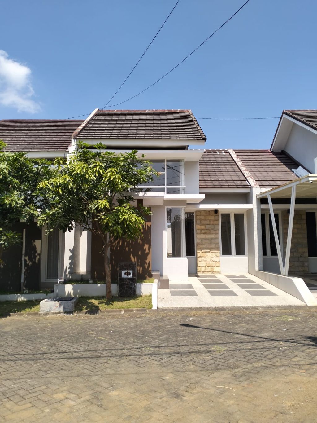 foto tampak rumah tipe 62 perumahan MOUNTAIN BOULEVARD
