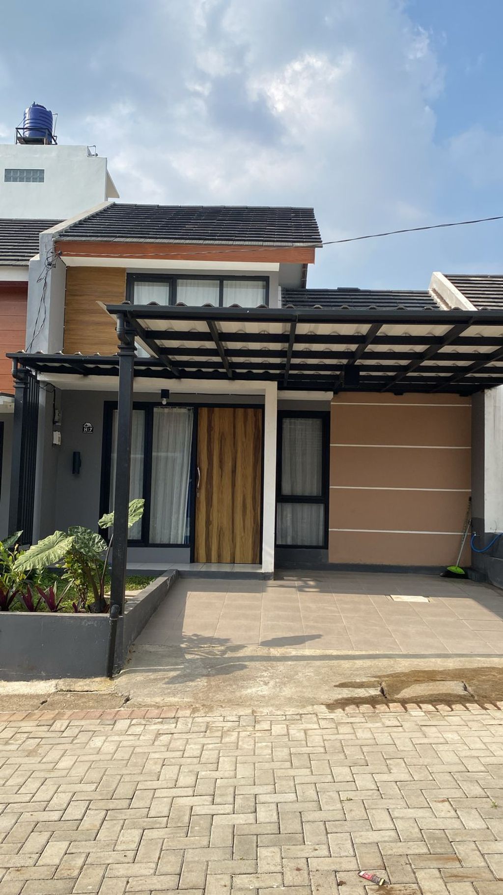 foto tampak rumah tipe 36 perumahan Green Mansion Cihanjuang