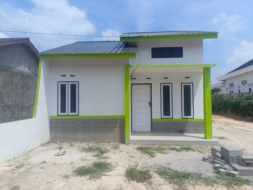 foto tampak rumah tipe 36 perumahan MUTIARA KARMILA 6