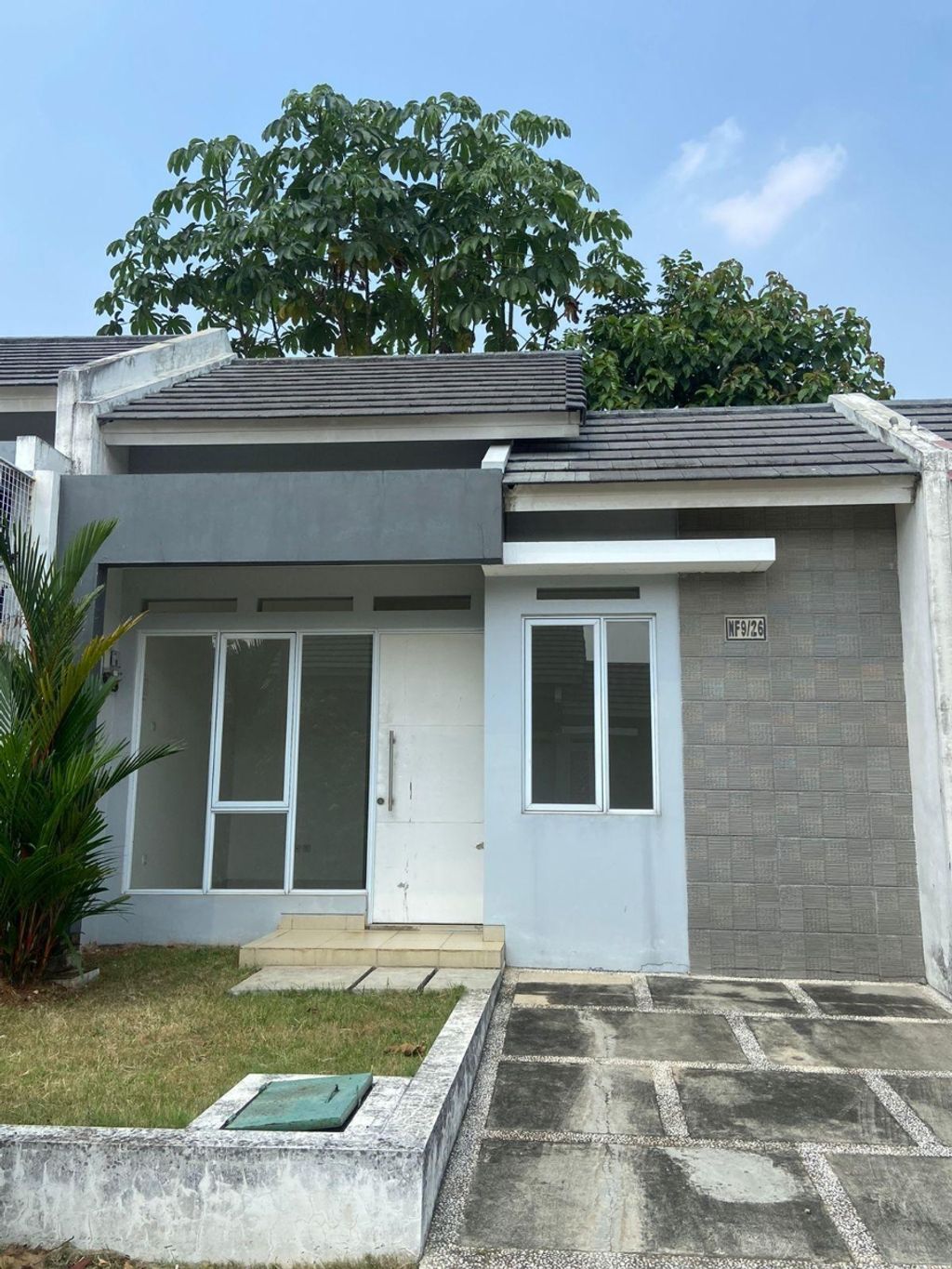 foto tampak rumah tipe NF9-26 perumahan SERPONG NATURA CITY