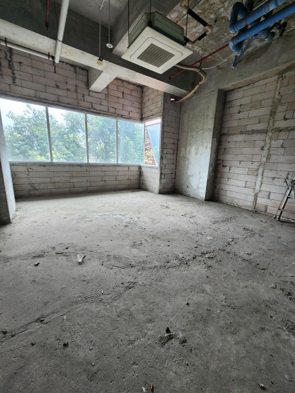 foto tampak rumah tipe SOHO perumahan Woodland Park Residence