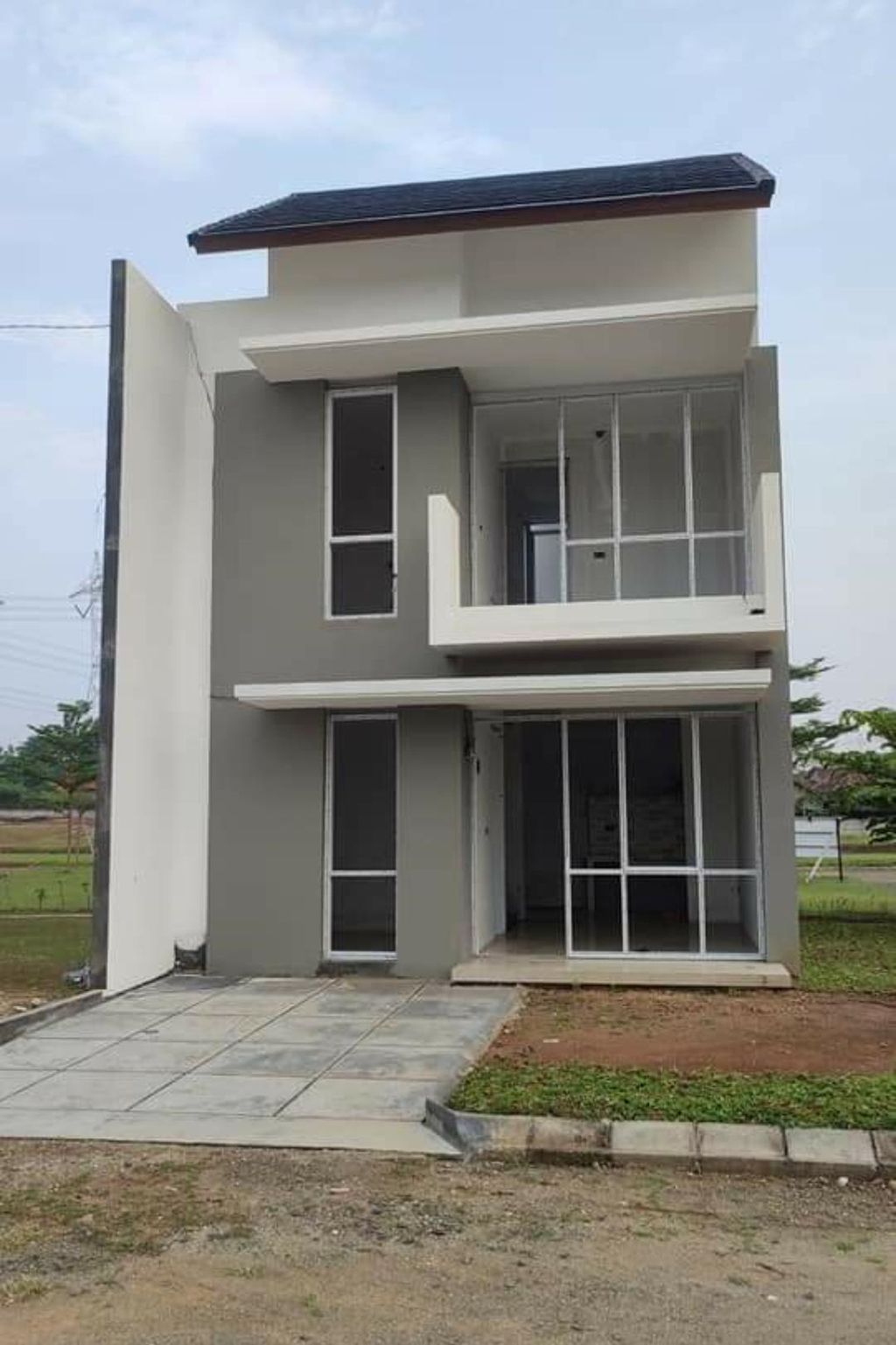 foto tampak rumah tipe MILLENIAL SUDUT perumahan Lialang Residence