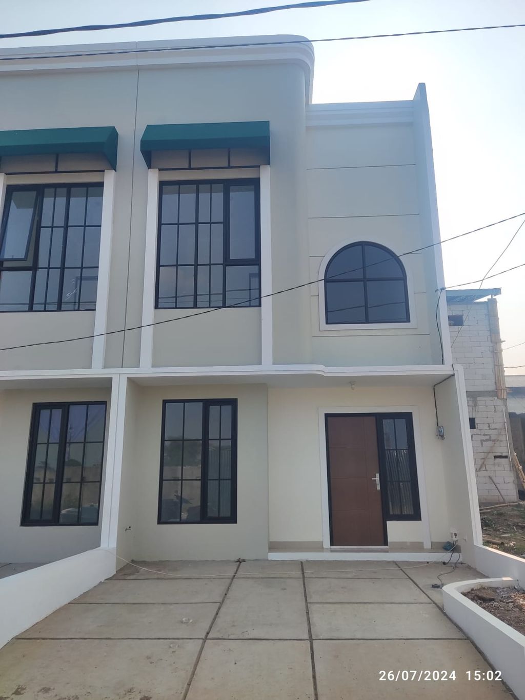 foto tampak rumah tipe 39 Alto Ceiling Awning (Mezanin) (463) perumahan G-Land Canola Residence