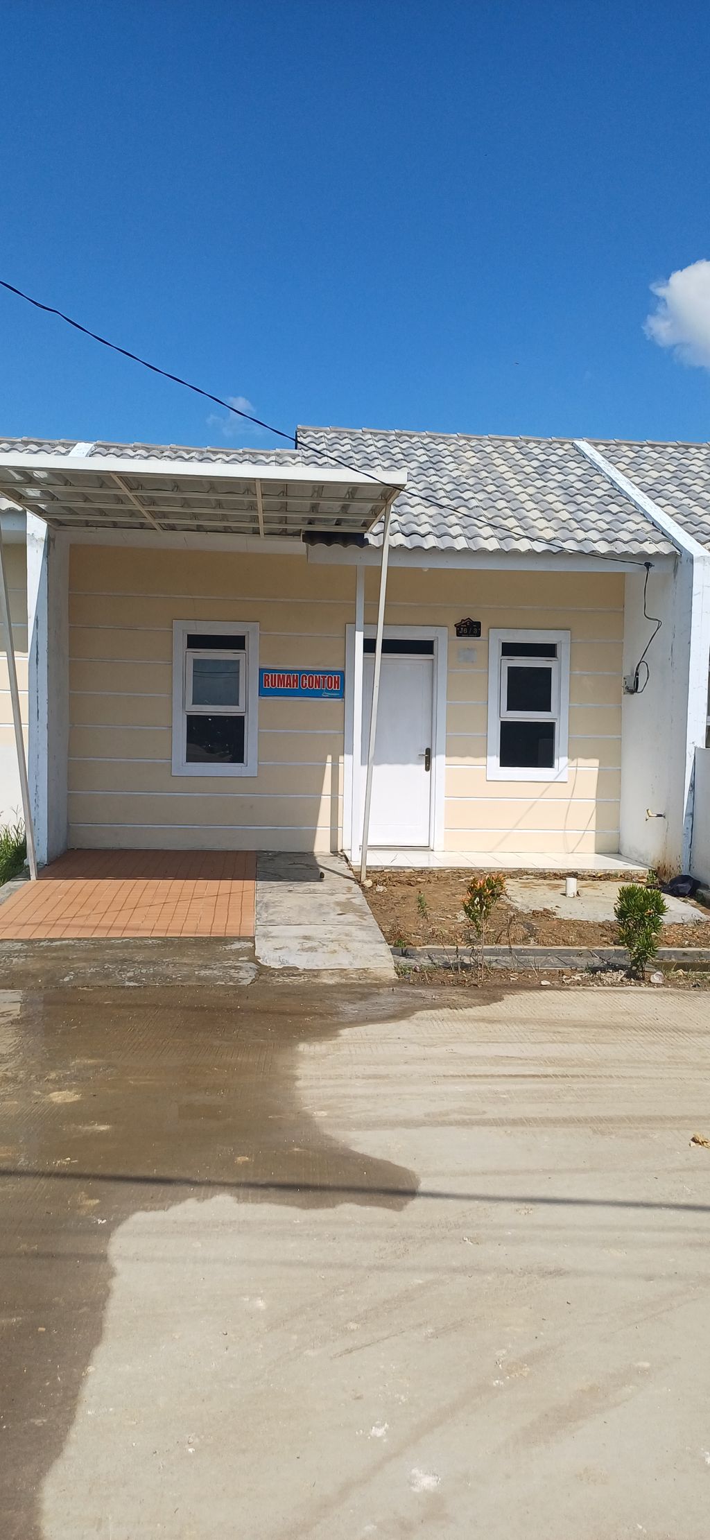 foto tampak rumah tipe 27/72 perumahan GRAHA CIPTA 5 SUMBERJAYA