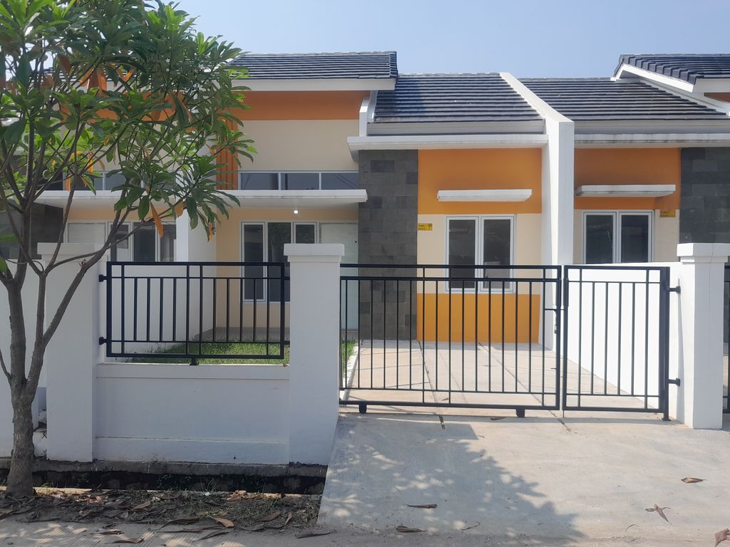 foto tampak rumah tipe Caltha 2024 perumahan Grand Tamansari Residence 1