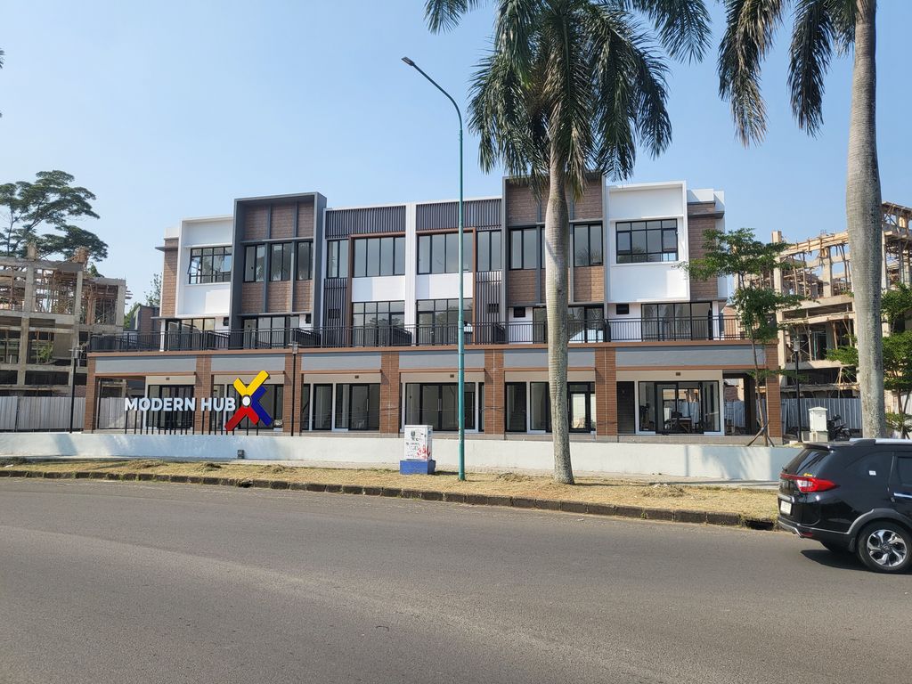 foto gerbang perumahan KOTA MODERN - RUKO MODERN HUB