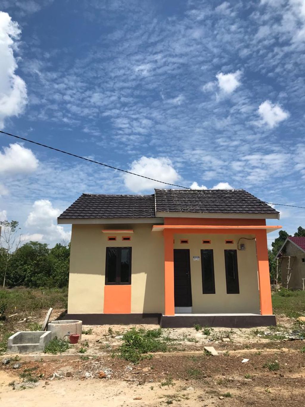 foto tampak rumah tipe 36 perumahan HUNIAN GUNTUNG MANGGIS ASRI