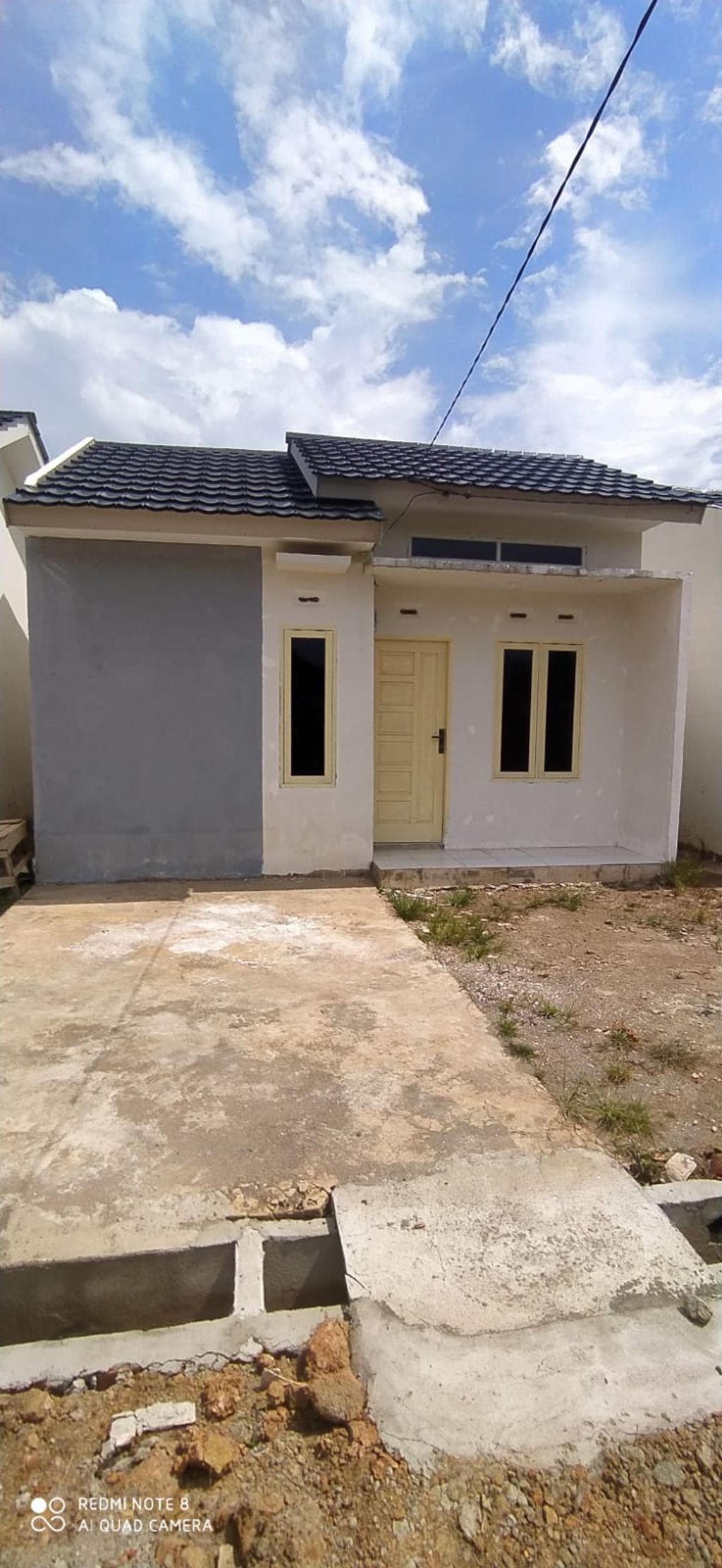 foto tampak rumah tipe 36 perumahan pinang jaya residence