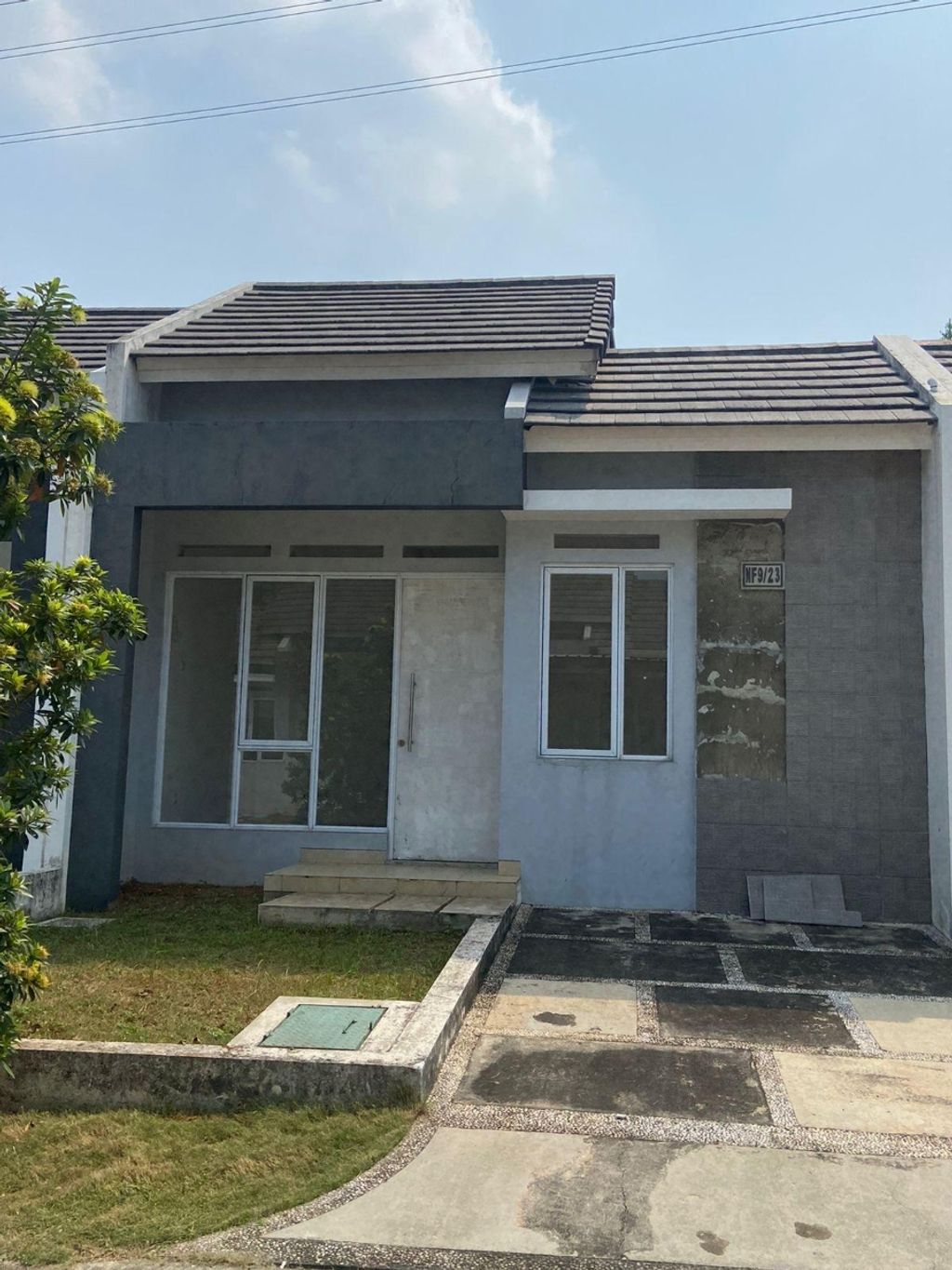 foto tampak rumah tipe NF9-0023 perumahan SERPONG NATURA CITY