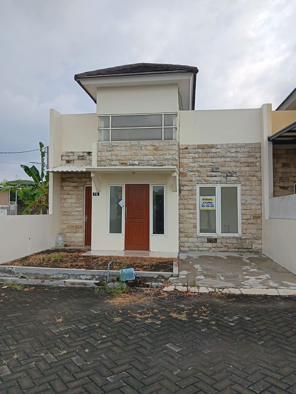 foto tampak rumah tipe Lavender perumahan Puri Asri Regency