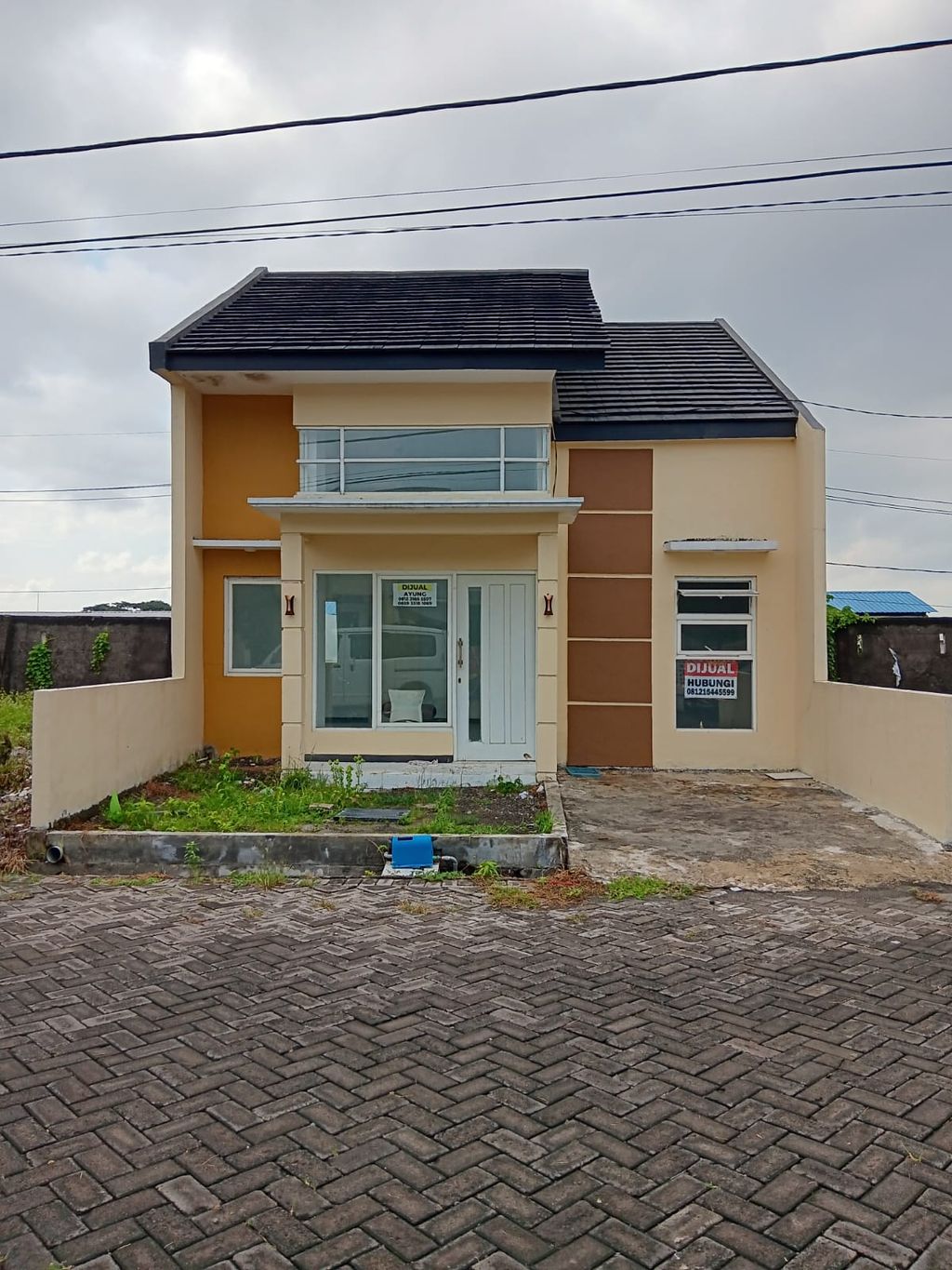 foto tampak rumah tipe Rose perumahan Puri Asri Regency