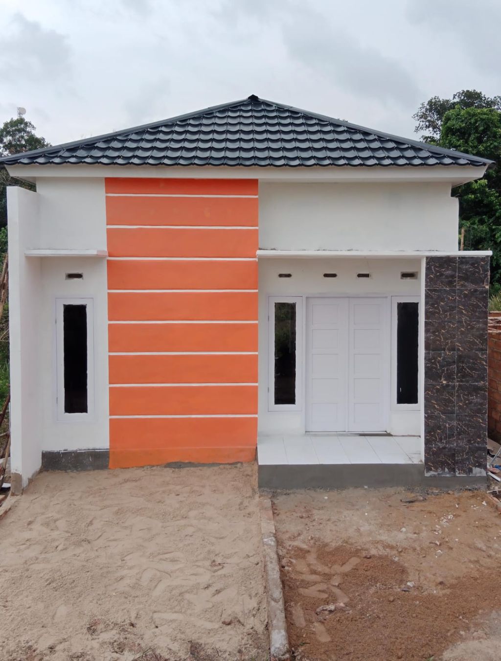 foto tampak rumah tipe 36 perumahan Perumahan Angsana Green Residence