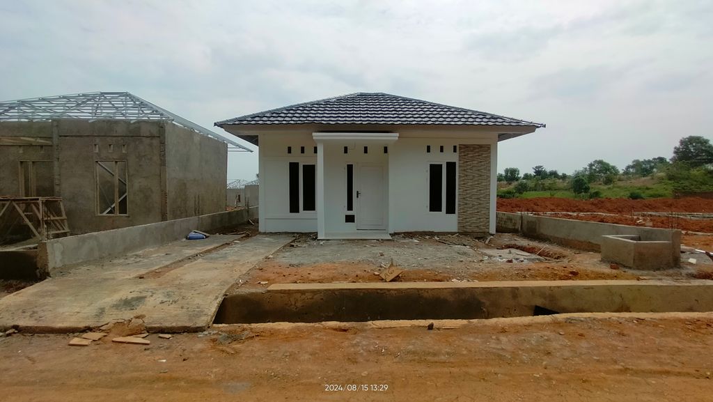 foto contoh rumah perumahan PUTRA RESIDENCE