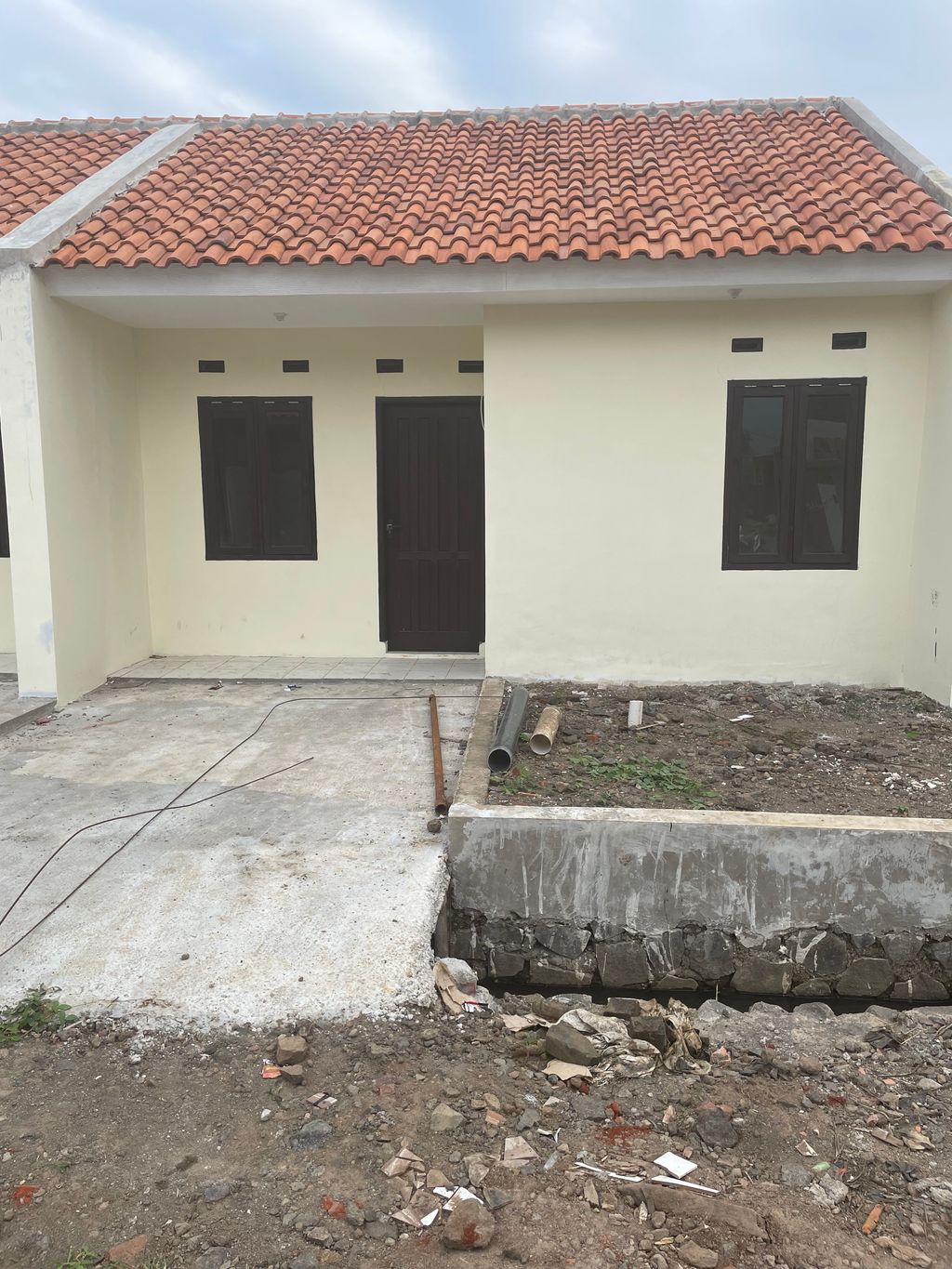 foto contoh rumah perumahan D Village Residence Nagarasari Tahap 2