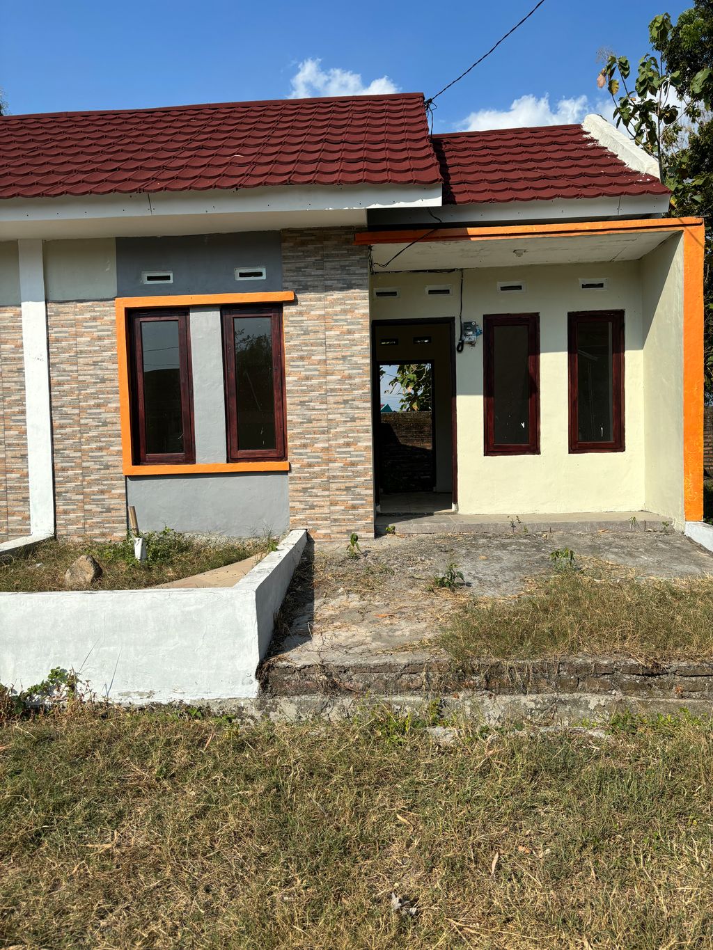 foto tampak rumah tipe 34/68 perumahan PERUMAHAN KARANGMOJO BARU