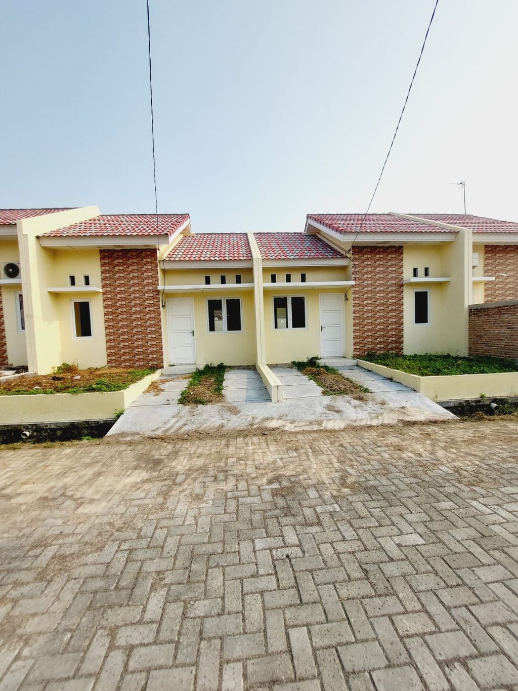 foto tampak rumah tipe 32/72 perumahan Grand Sutera Kragilan