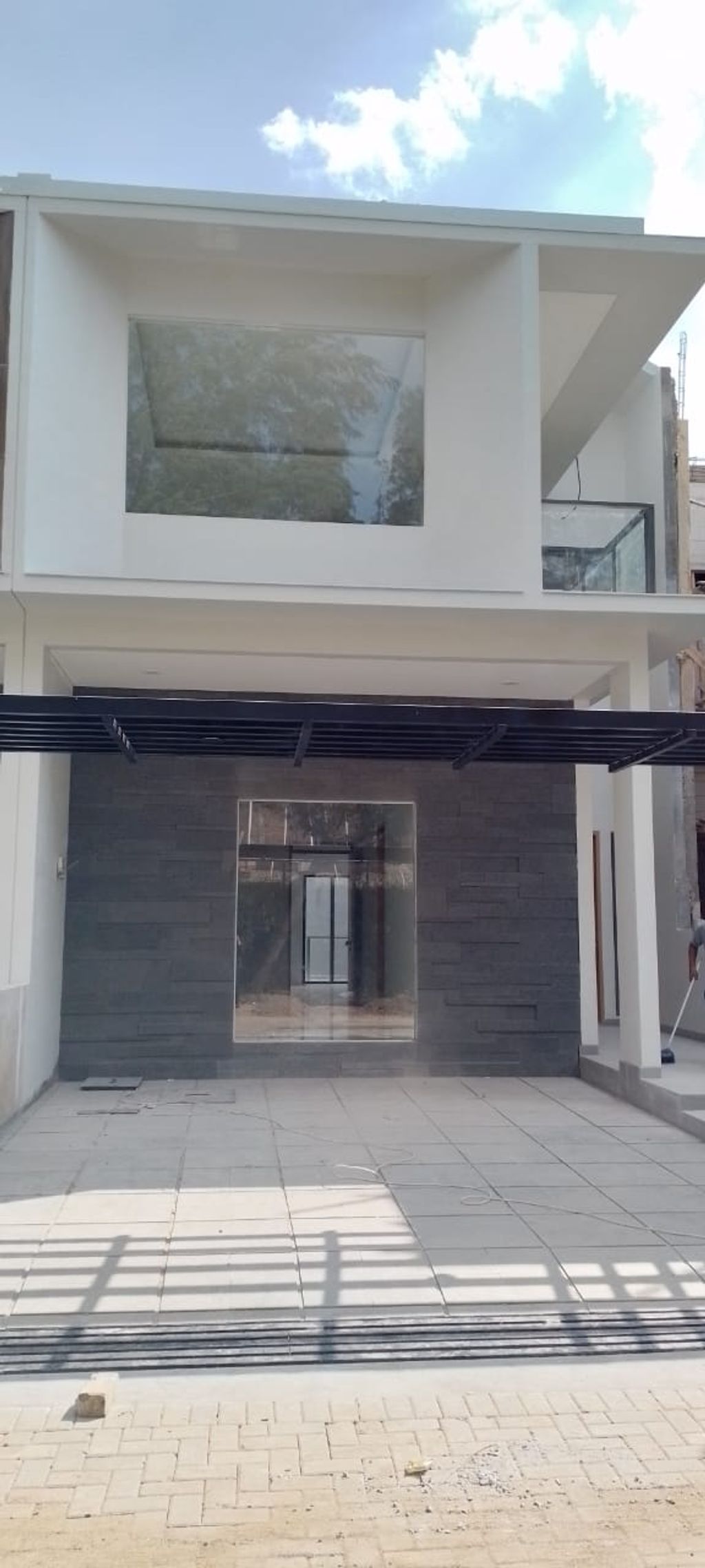 foto tampak rumah tipe Harmoni perumahan PT Graha Pinus Asri