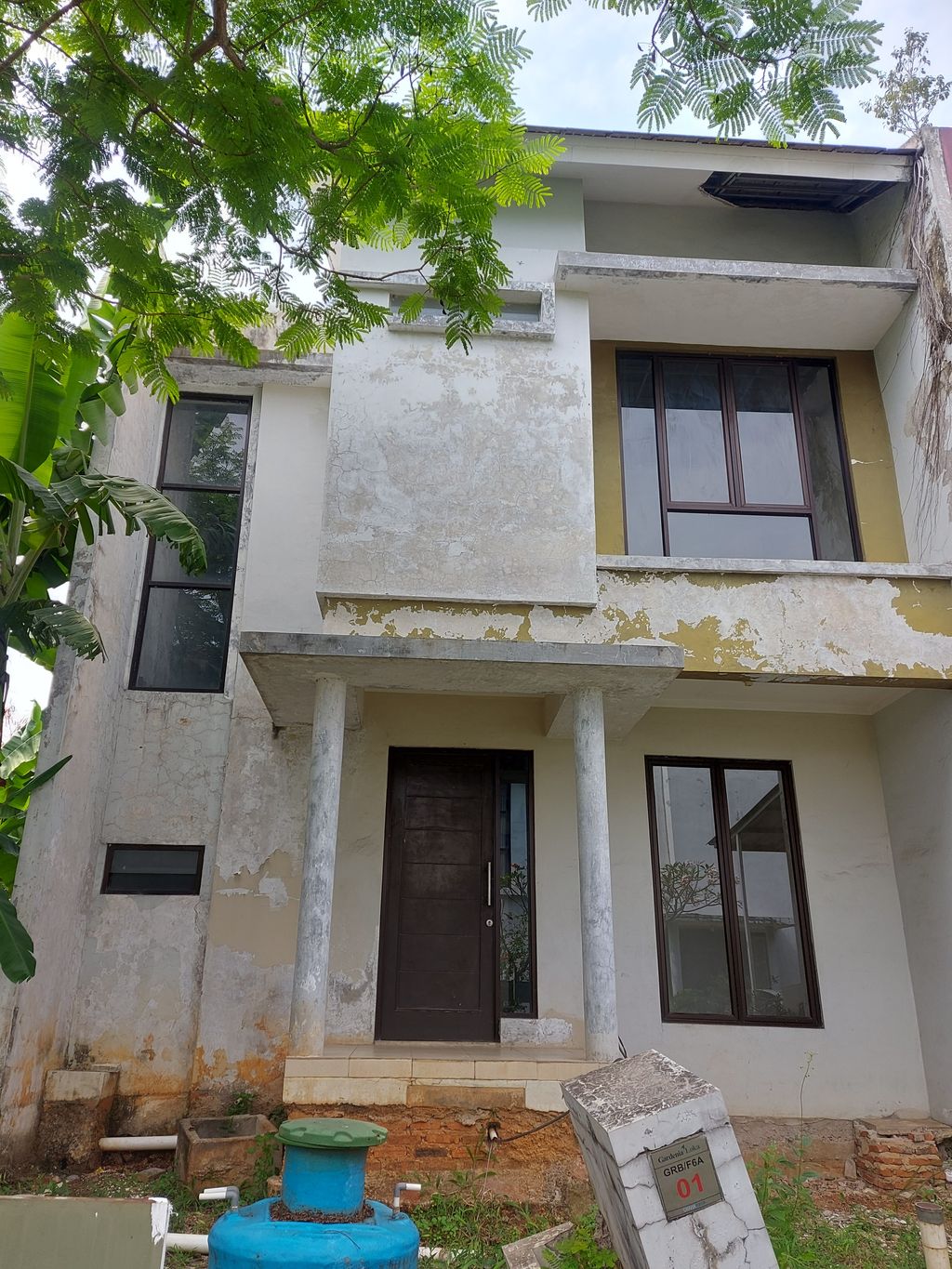 foto tampak rumah tipe NEO GARDENIA KHUSUS perumahan GRAHA RAYA NEO GARDENIA LOKA