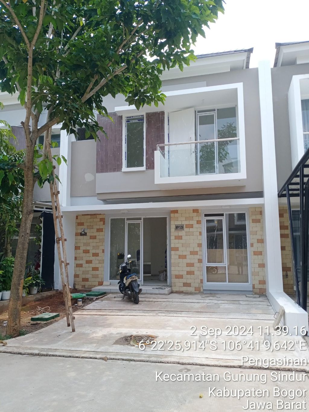 foto tampak rumah tipe RV1-09 perumahan SERPONG NATURA CITY