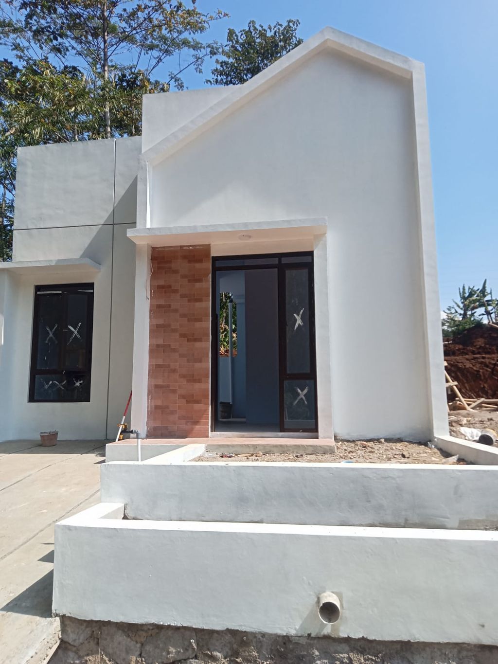 foto tampak rumah tipe 34/60 perumahan PANORAMA SIRNAJAYA RESIDENCE