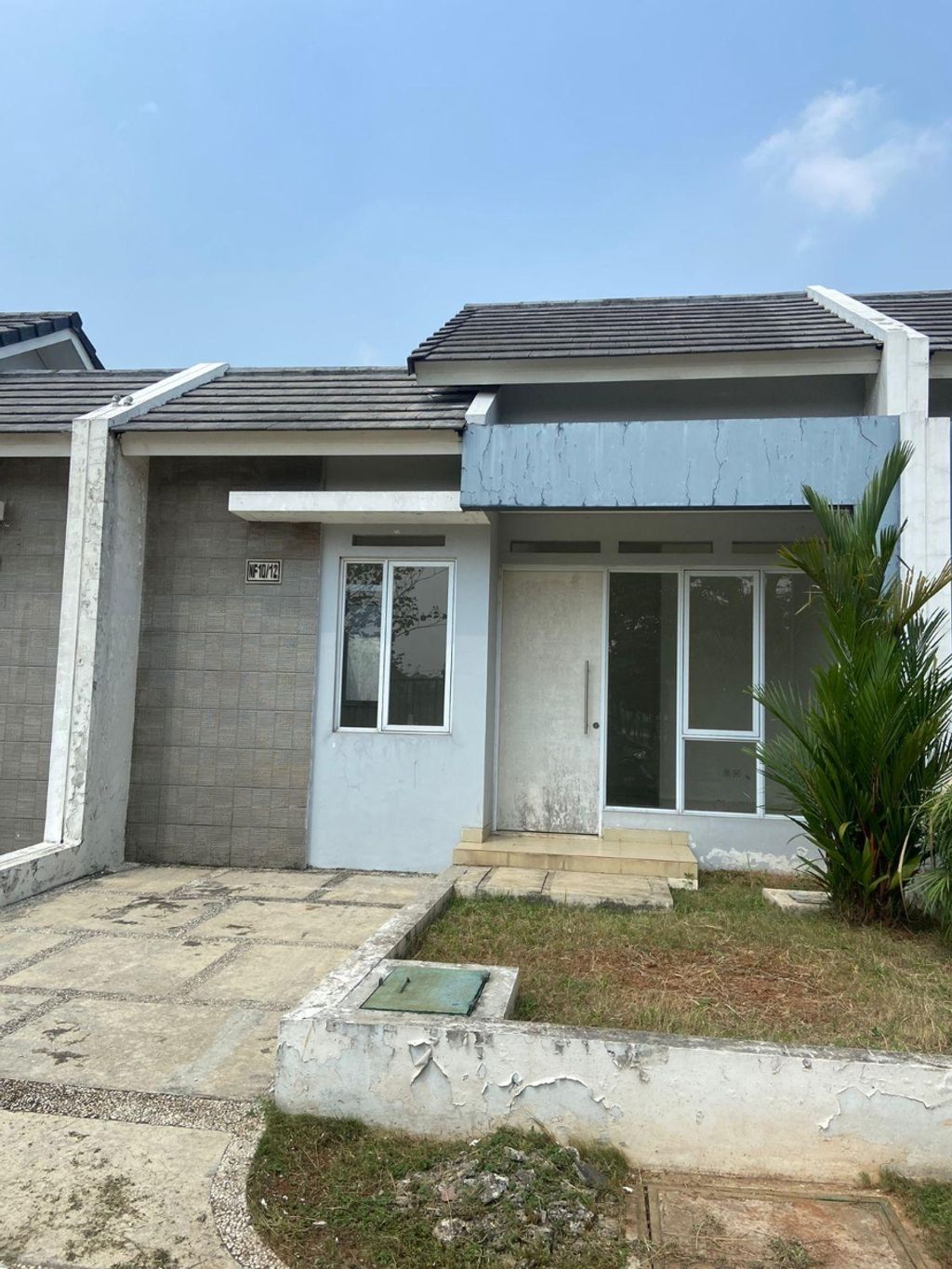 foto tampak rumah tipe NF10-0012 perumahan SERPONG NATURA CITY