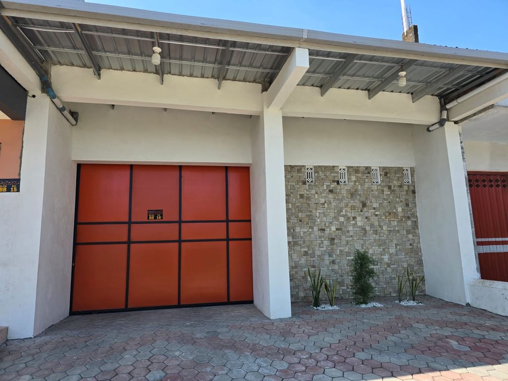 foto tampak rumah tipe 50 perumahan QUEEN GARDENIA BOULEVARD