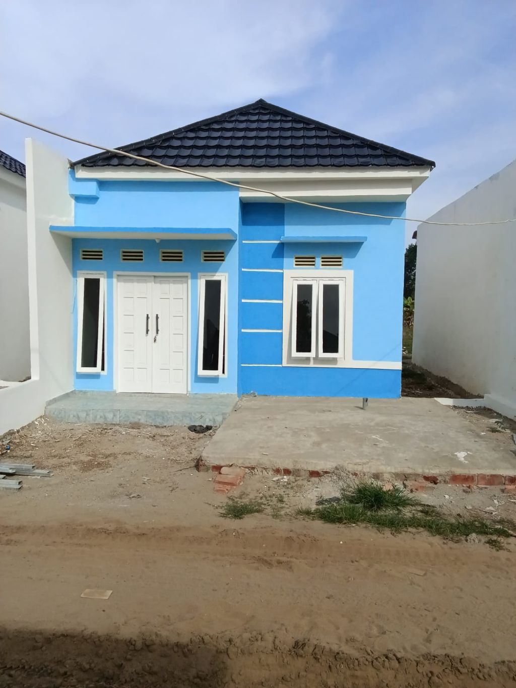 foto tampak rumah tipe 36/84 perumahan Grand Kedaton