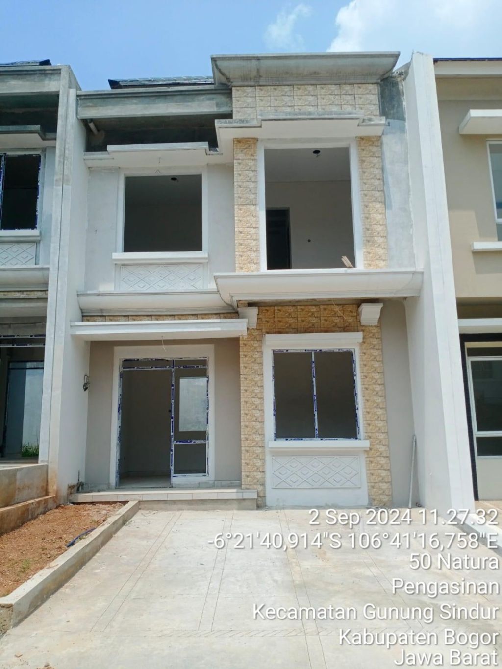 foto tampak rumah tipe NG3-32 perumahan SERPONG NATURA CITY