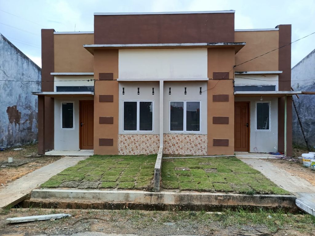 foto tampak rumah tipe Blok C New perumahan Perumnas Baru Bumi Tanjung Permai 2