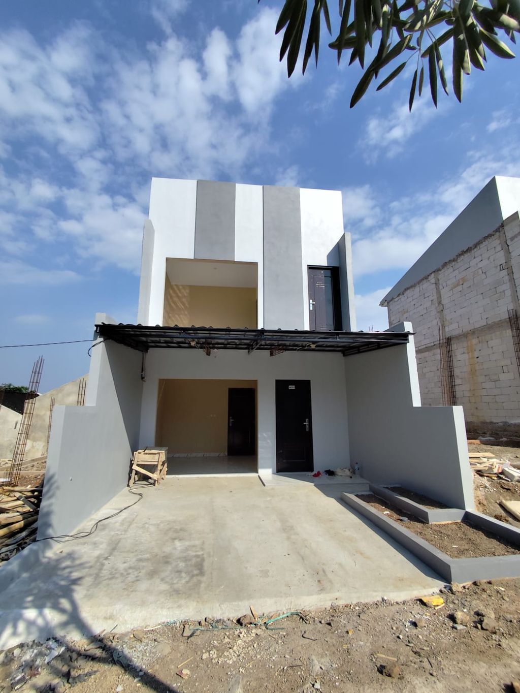 foto tampak rumah tipe SAKURA perumahan Hukoci Green Residence