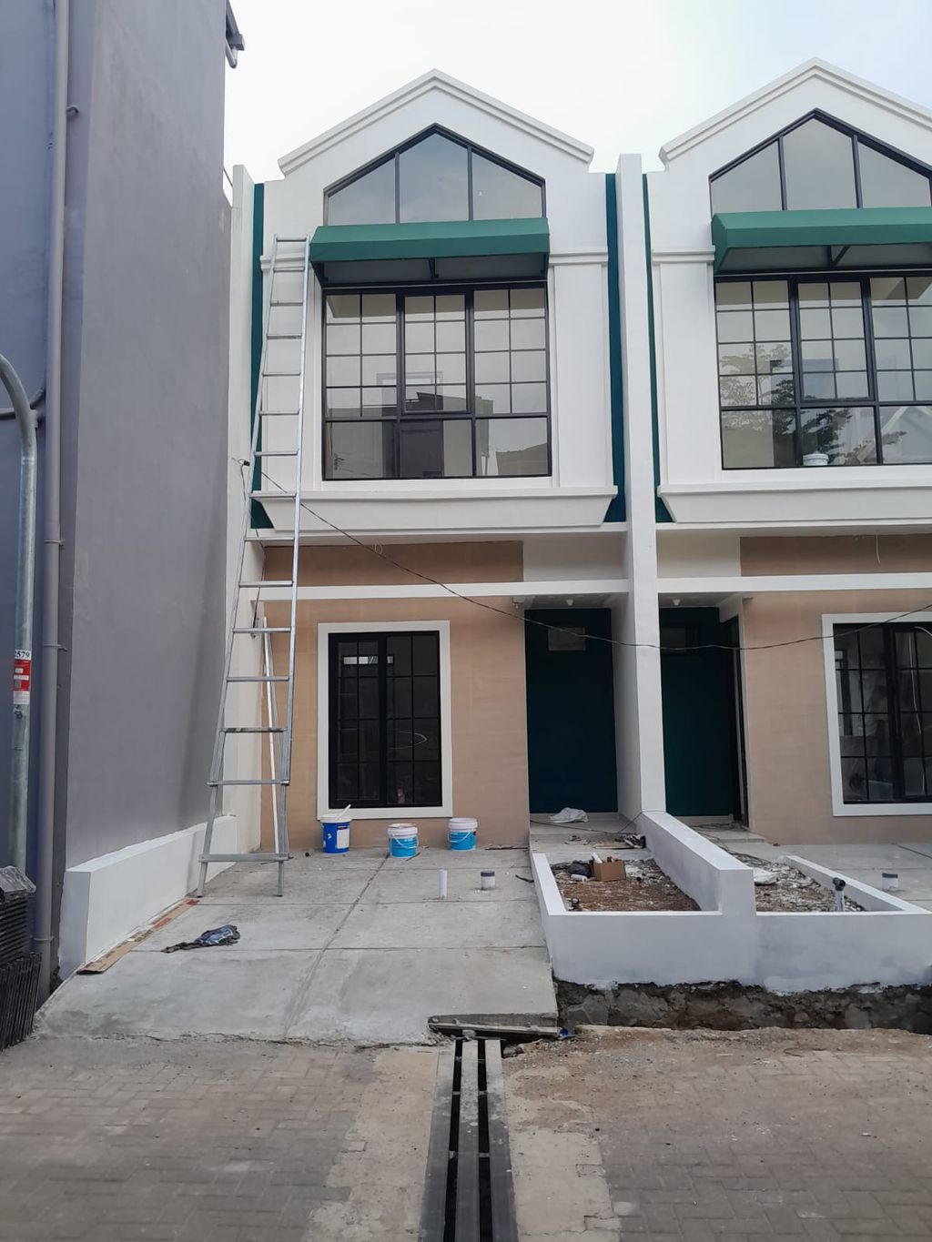 foto tampak rumah tipe 50 Compact Classic Modern HC (3KT)(577) perumahan G-Land Cilengkrang Residence Blok G-I
