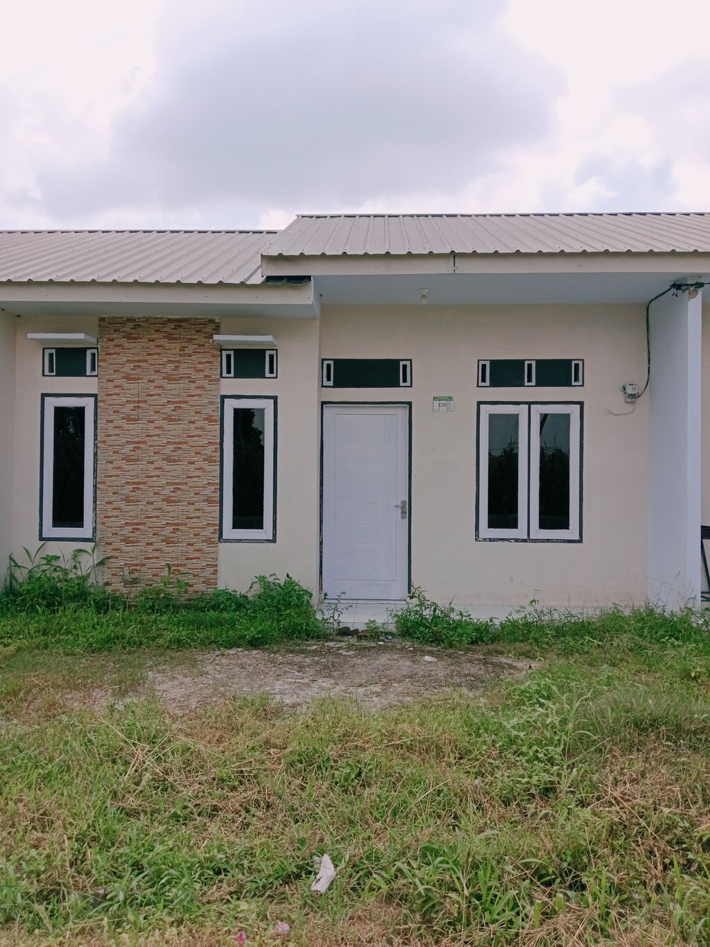 foto tampak rumah tipe 36/91 perumahan Jati Mas Artomoro Residence Tahap II