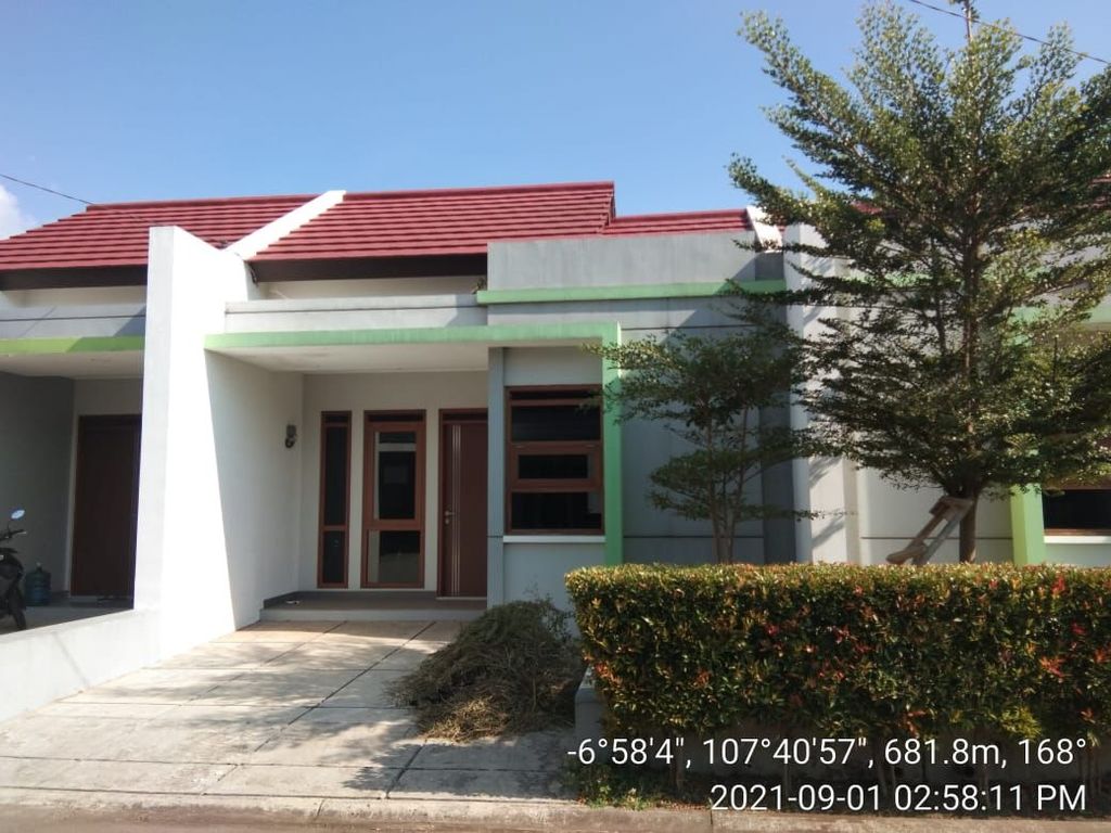 foto tampak rumah tipe 108/116 perumahan DERWATI MAS