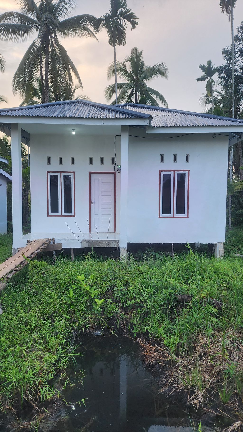 foto tampak rumah tipe 36/200 perumahan BOEMI BERKAH RESIDENCE
