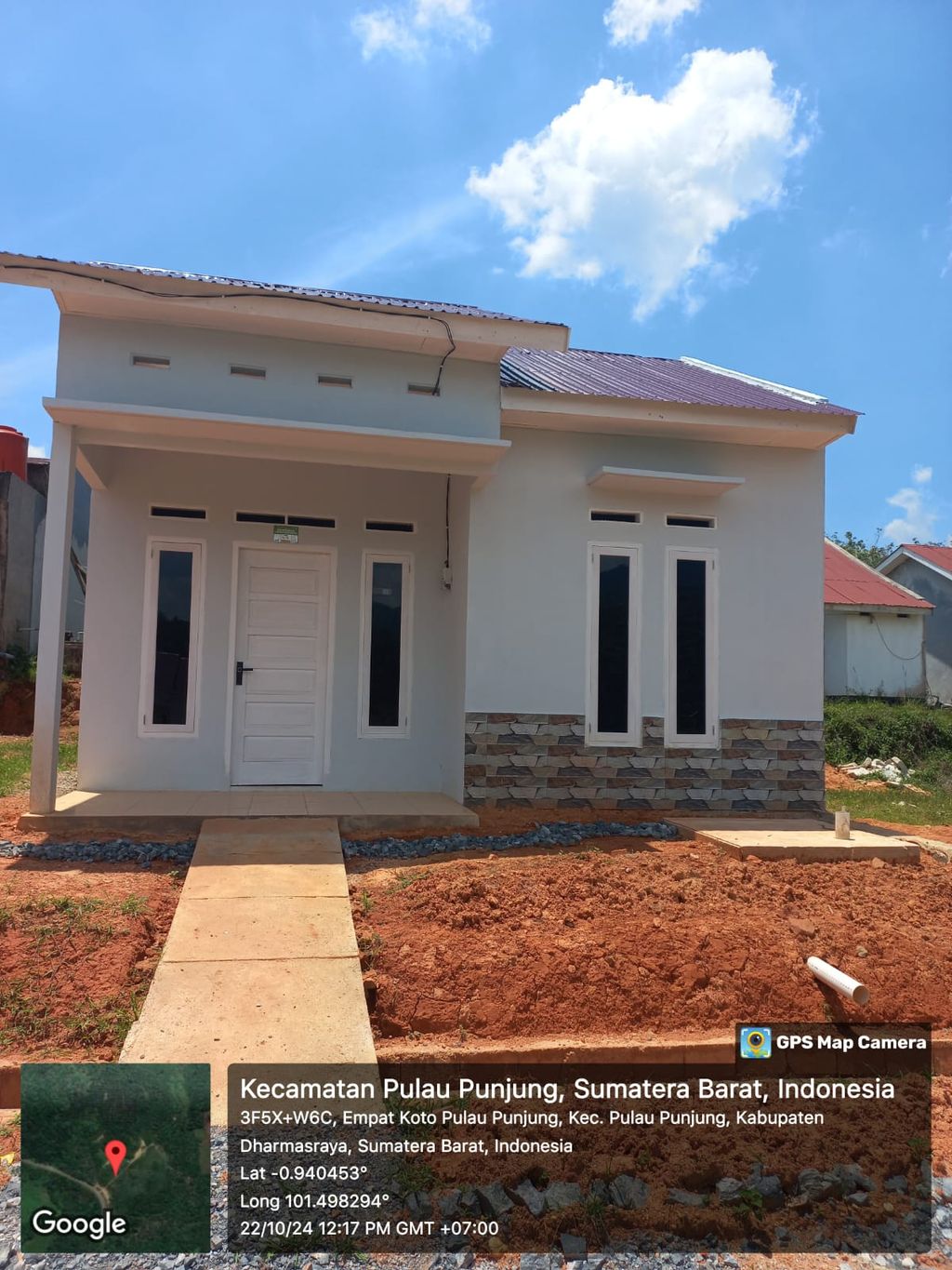 foto tampak rumah tipe 36/108 perumahan DHARMAS REGENCY