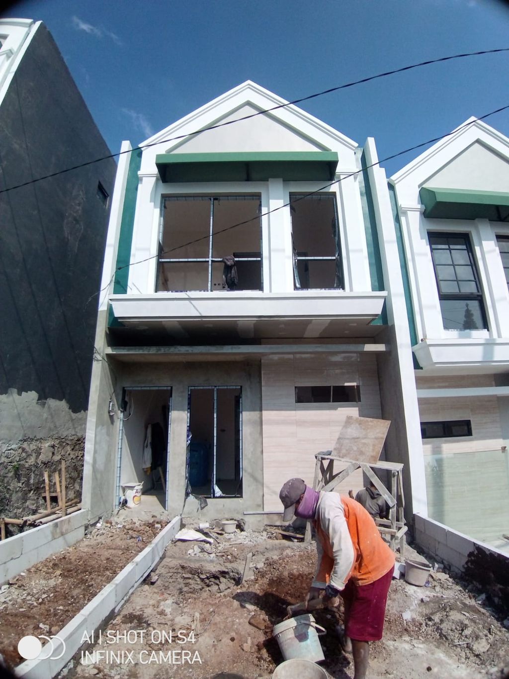 foto tampak rumah tipe 41 Compact Classic Modern HC (2KT)(452) perumahan G-Land Cilengkrang Residence Blok G-I