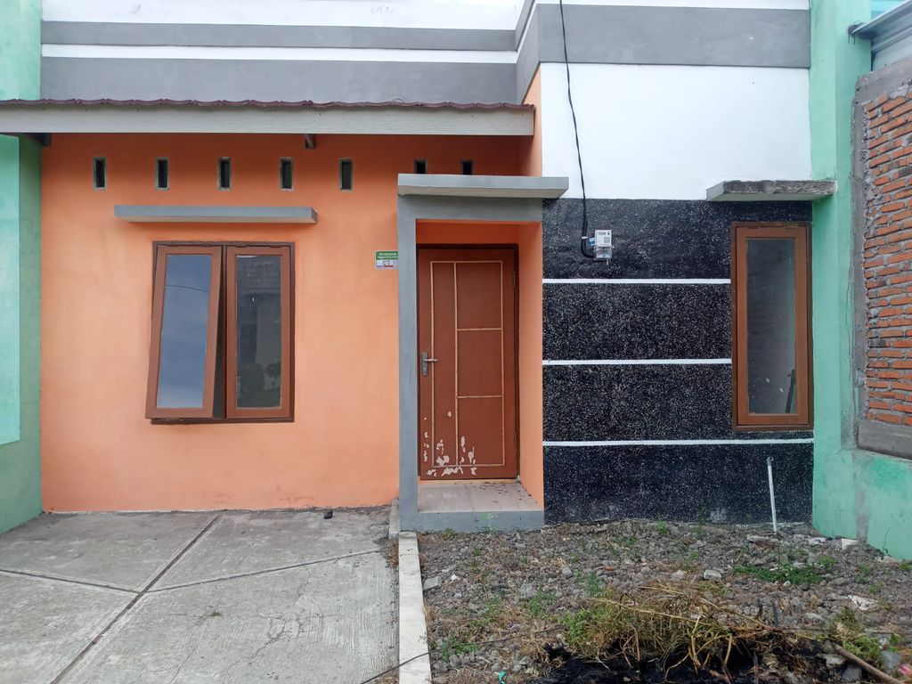 foto tampak rumah tipe 24 perumahan WELL GREEN RESIDENCE
