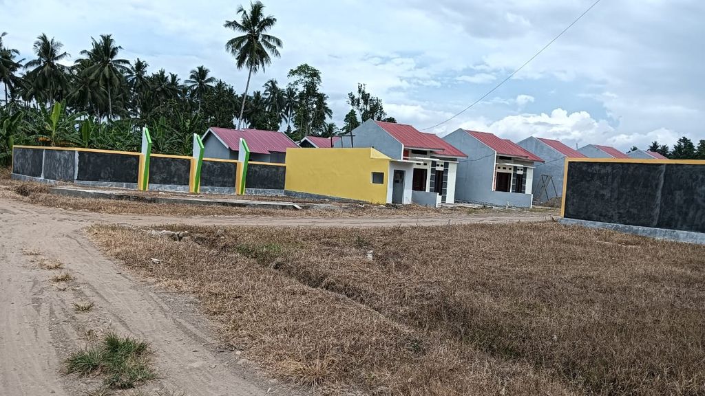 foto gerbang perumahan GRAND MUTIARA POYOWA