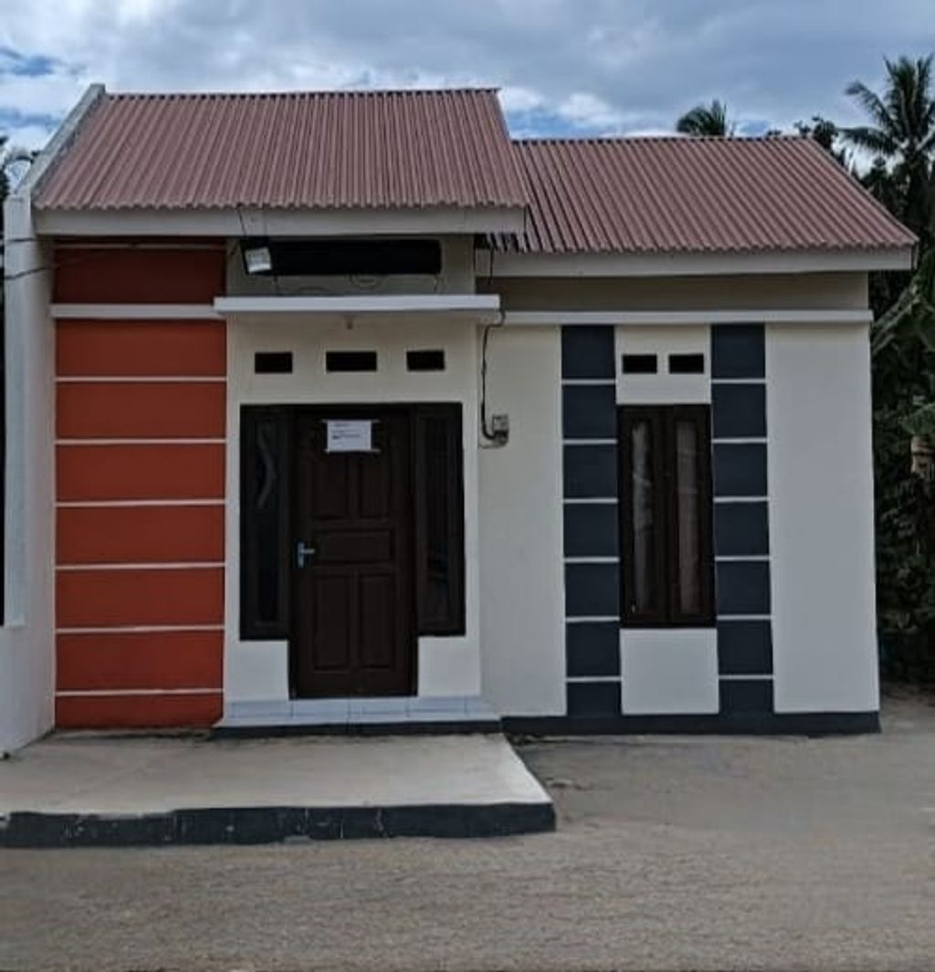 foto tampak rumah tipe GMP 36 perumahan GRAND MUTIARA POYOWA