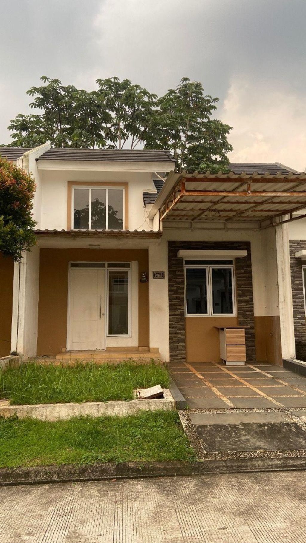 foto tampak rumah tipe NC7-15 perumahan SERPONG NATURA CITY