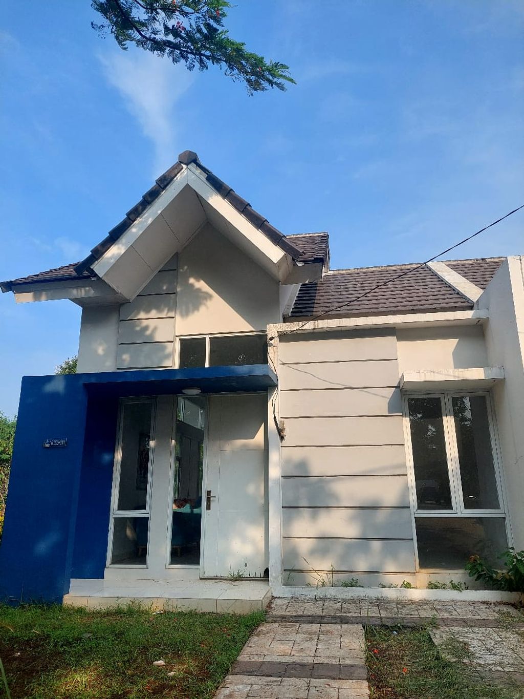 foto tampak rumah tipe MONTANA 1014 perumahan MUTIARA GADING CITY - LONDON BLV