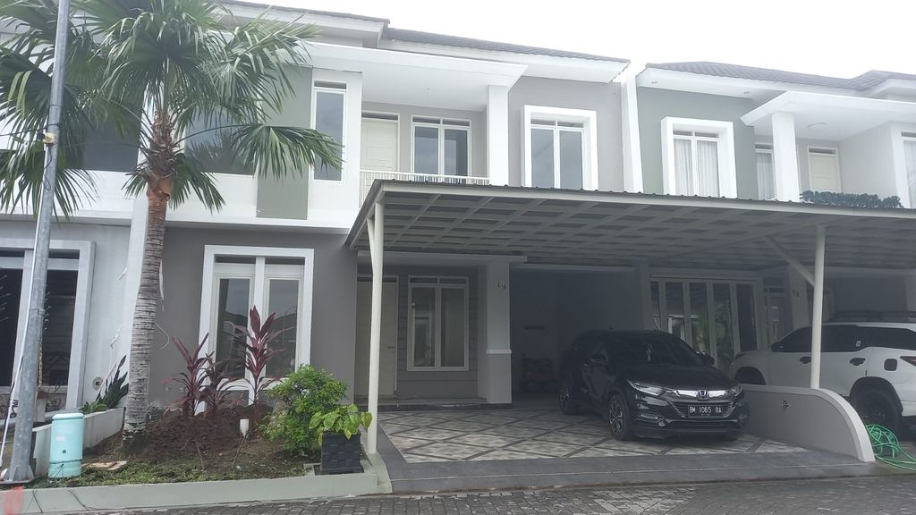 foto tampak rumah tipe E 10 187/140 perumahan MEGA ASRI SUDIRMAN