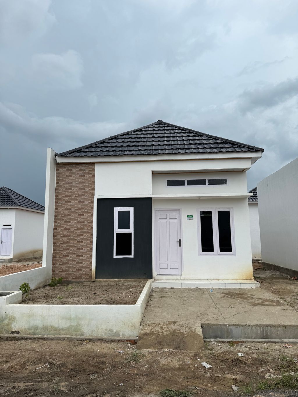 foto tampak rumah tipe 36/96 perumahan GRIYA AGUNG RESIDENCE