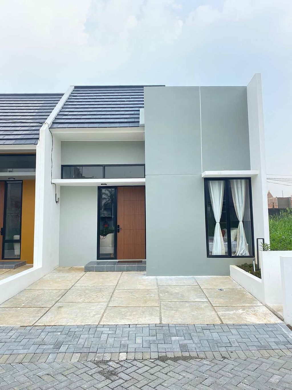foto tampak rumah tipe 36 perumahan KAYU MANIS RESIDENCE