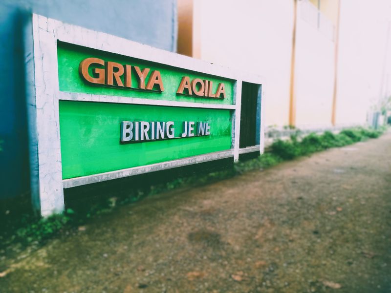 foto gerbang perumahan GRIYA AQILA BIRING JE'NE